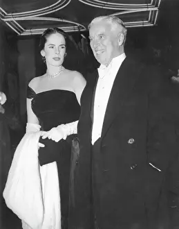 Oona Oneill Prints: Charlie and Oona Chaplin Arriving at a Film Premiere