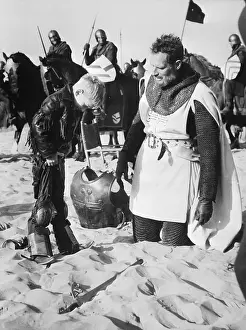 Trying On Prints: Charlton Heston's Son Trying on Armor