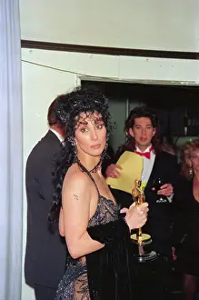 Cher Posing with Her Oscar