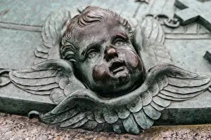 Helsinki Prints: Cherubs face on a grave of Augustin EhrensvAÔé¼rd at Suomenlinna, Finland