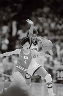 Cheryl Miller and Aei-Young Choi Playing Olympic Basketball