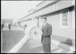 Engineering Prints: Chester Minkler Posing with His War Invention