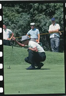 Chi-Chi Rodriguez Preparing For a Putt