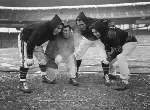 Warm Up Exercise Prints: Chicago Bears Players Huddle in Cold