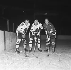Three Chicago Black Hawks on the Ice