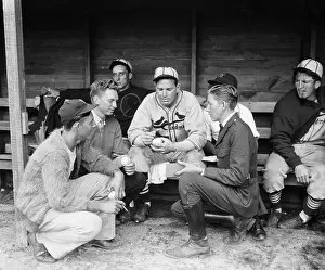 Autographing Prints: Chicago Cubs Pitcher Dizzy Dean Signing Baseballs