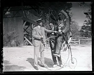 Chief White Horse Eagle Seated on Bicycle