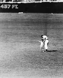 Autographing Prints: Child Asks Joe Dimaggio For Autograph