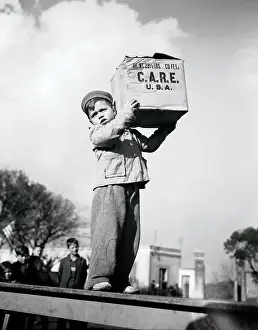 Child Carrying C.A.R.E. Package In Rome