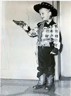 Toy Gun Prints: Child Dressed as a Cowboy