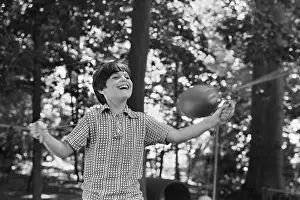 Child Using Muscle Coordination Toy