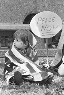 Sit In Prints: Child Wrapped in Flag Sitting by Peace Sign
