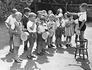 Teamwork Prints: Children (4-5) playing in orchestra