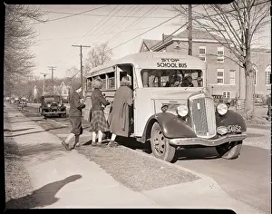 Three Children Boarding School Bus