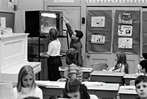 Children In Clasroom Watching Television