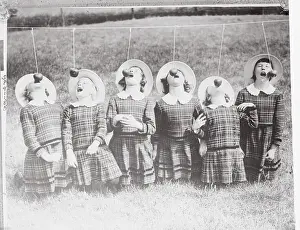 Apple Prints: Children Competing in a Bob Apple Contest