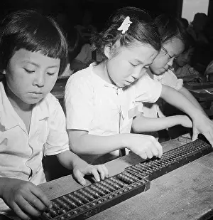 Seoul Prints: Children Compute with Abaci