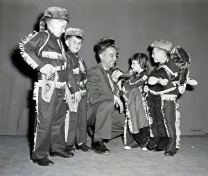 Squatting Prints: Children Dressed as Davy Crockett with Garry Moore