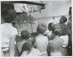 Children Gazing at Portraits of Big Four of Geneva Summit