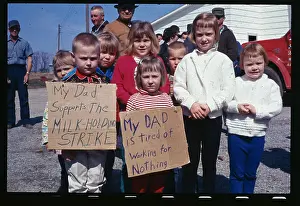 Children Holding Signs