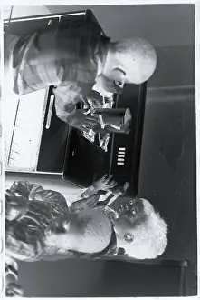 Scarcity Prints: Children Huddling Around Stove for Heat