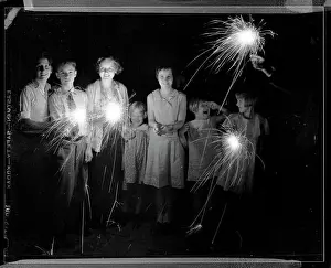 Festivity Prints: Children Laughing and Holding Sparklers