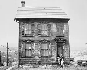 Children Leaving Abandoned House