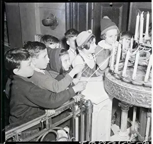 Children Lighting Candles