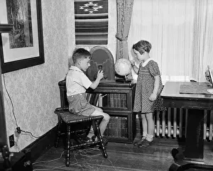 Nephew Prints: Children Listen to Radio for News of Amelia Earheart