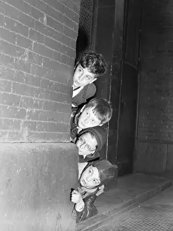 Corner Prints: Four Children Peeking Around A Corner