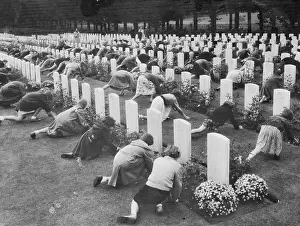 Children Placing Flowers on Graves