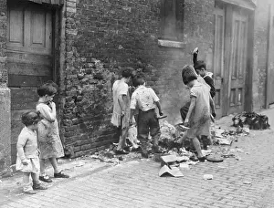 Slum Prints: Children Playing with Garbage