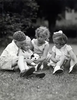 Children Playing with Puppy