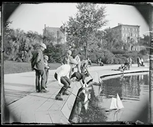 Artificial Lake Prints: Children Playing with Sailing Boats