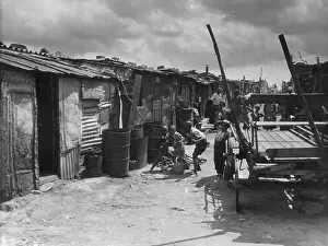Poor Person Prints: Children Playing in Shantytown Street