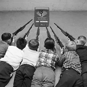 Electronic Prints: Children Playing With Toy Gun Set