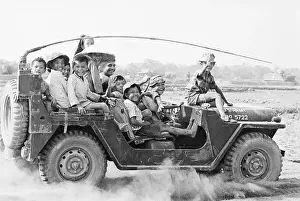 Cu Chi Prints: Children Riding in an Army Jeep