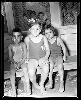 Three Children Seated at Coney Island