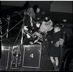Fire Engine Prints: Children Seated with Santa on a Truck