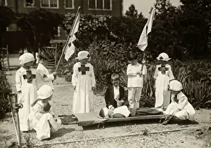 First Aid Prints: Children Staging Red Cross First Aid Drill During World War I