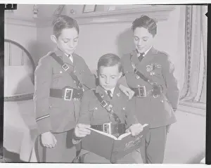 Children of the Stars in Uniform and Sharing a Book