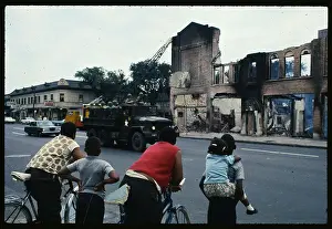 Children Stop on Burned Out Detroit Street
