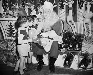 Four Children with Store Santa Claus