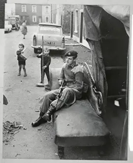 Belfast Prints: Children Sweeping Street While Soldier Rests