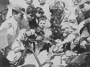 Jordan Prints: Children Taught to Disassemble Machine Gun