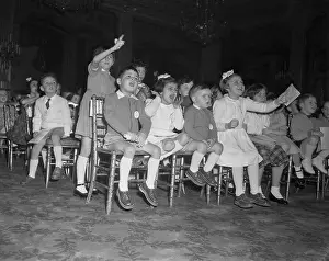 Children Watching a Puppet Show