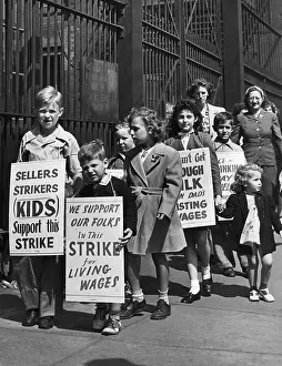 Children Wear Signs on Picket Line