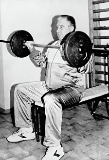Chilean President Augusto Pinochet Lifting Weights