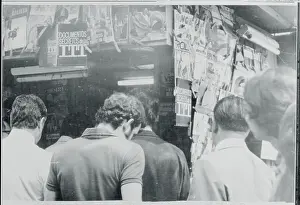 Chileans Crowding at Newsstand