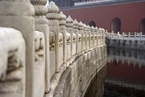 Chinese architectural elements, a dramatic view of a moat and distant doorways